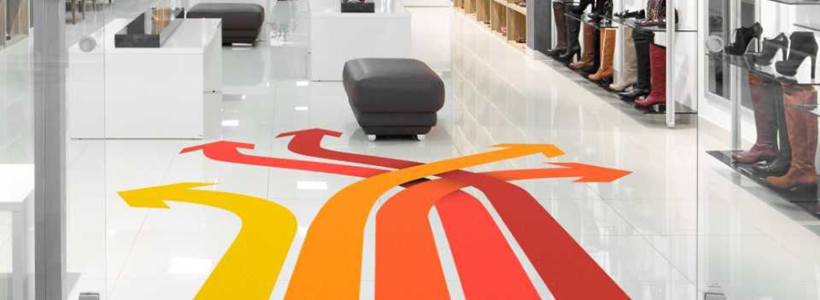 Infografica per pavimenti con 4 frecce intrecciate e colorate con una scala di colori che va dal giallo al rosso