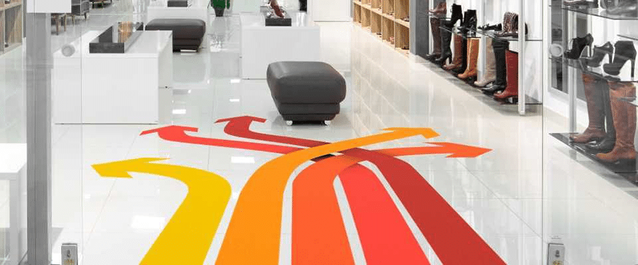 Infografica per pavimenti con 4 frecce intrecciate e colorate con una scala di colori che va dal giallo al rosso